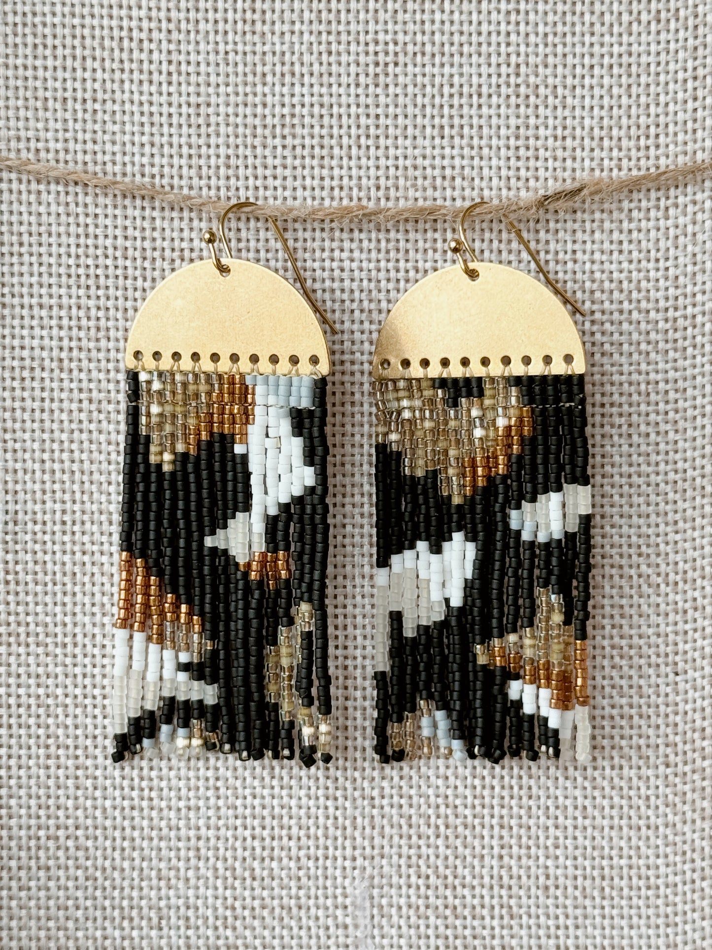 Golden black fringe earrings