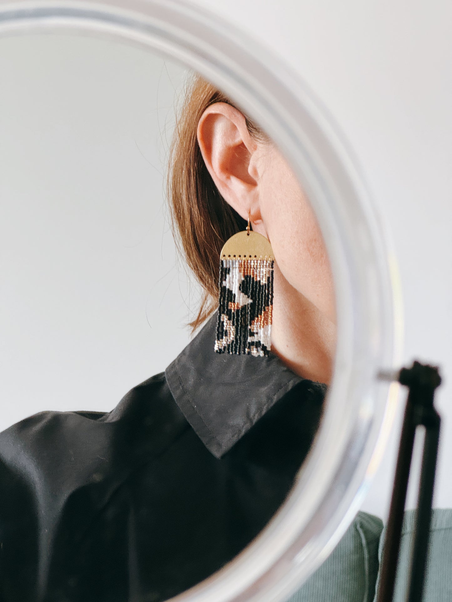 Golden black fringe earrings